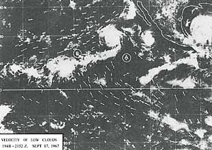 Satellite photo showing the clouds moving towards the convergence areas B, C, and D. The arrows indicate the directions of the wind.